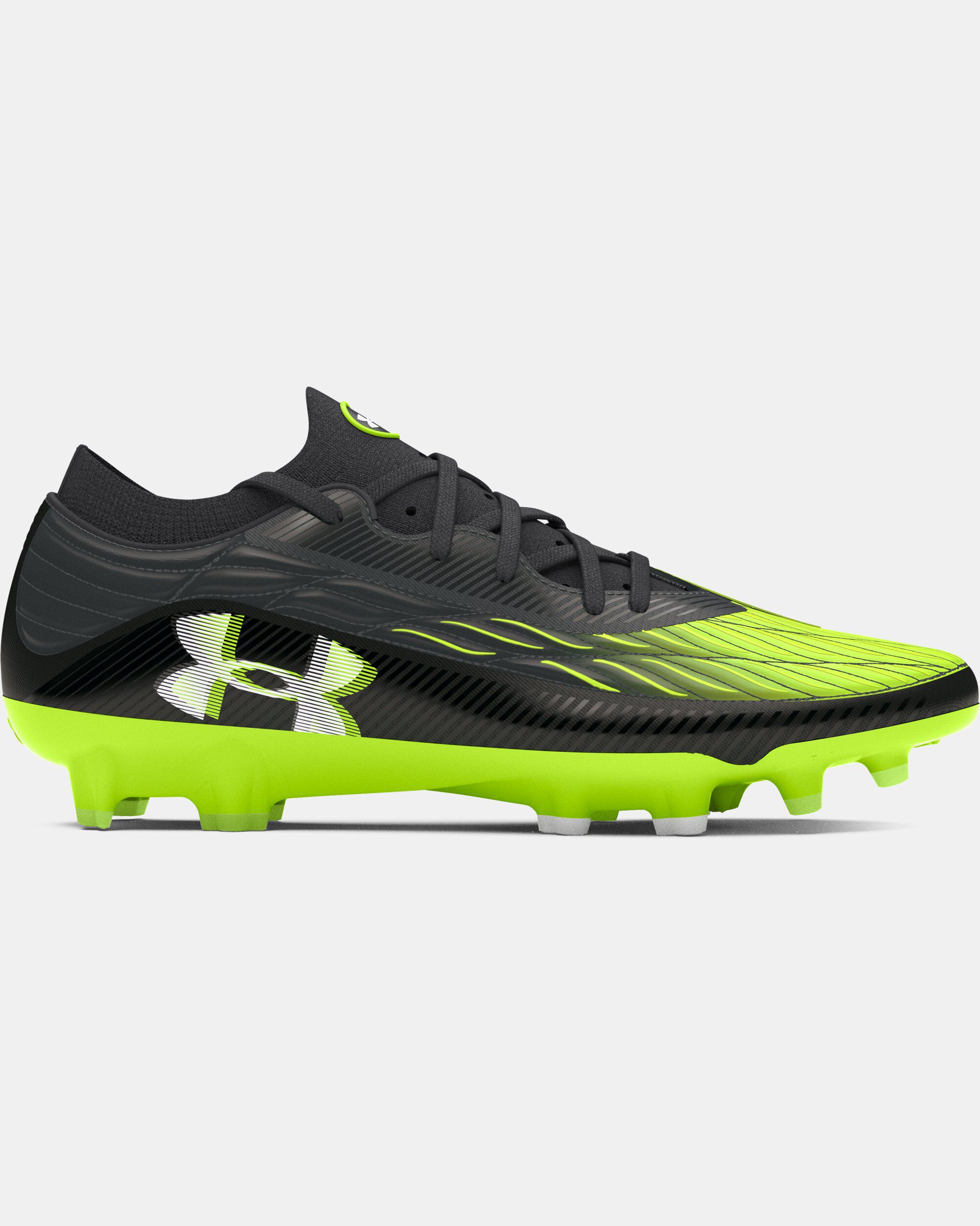 green and black football cleats