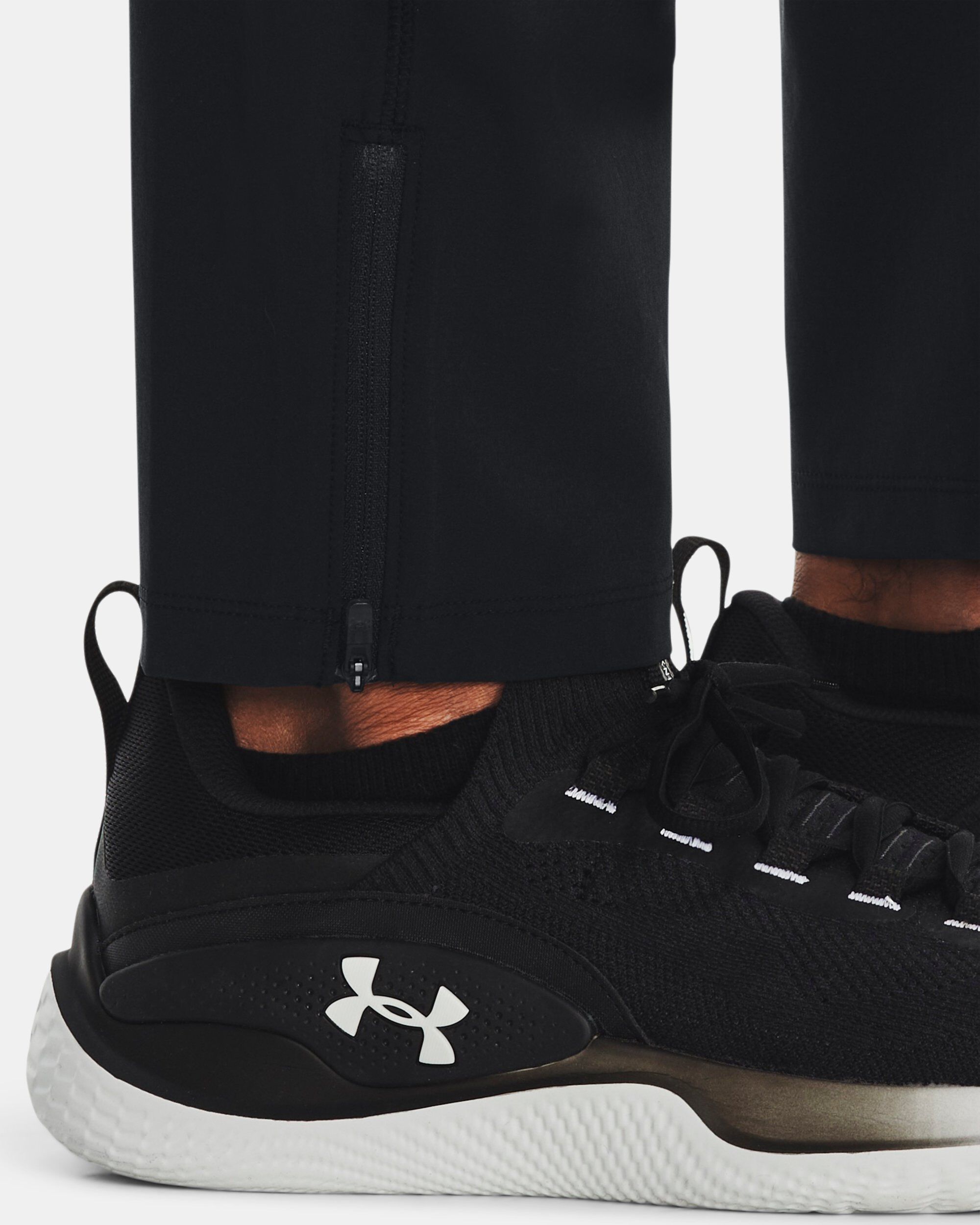 Under armour storm joggers black hot sale