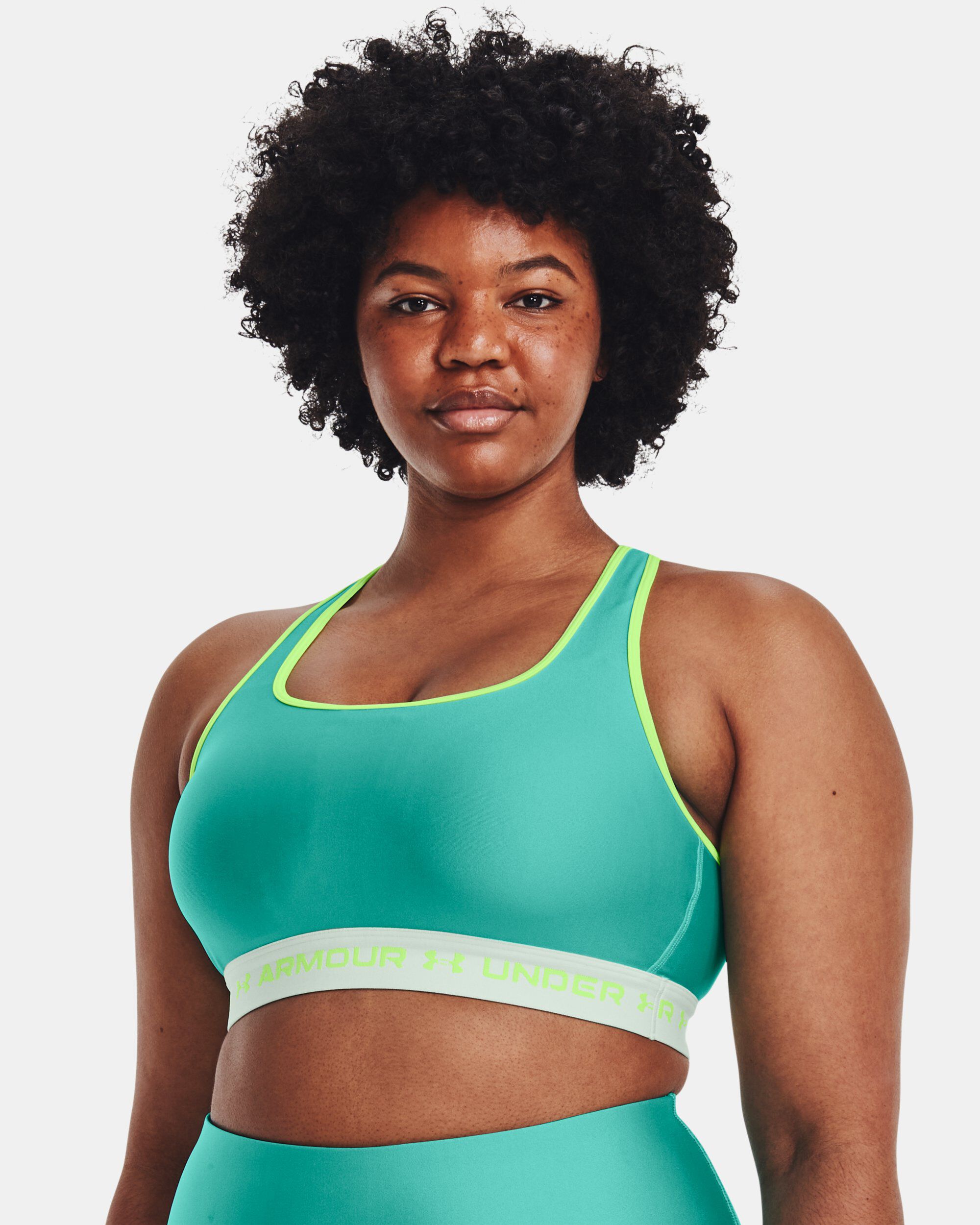 Buy Women s Armour Mid Crossback Pocket Sports Bra Green in Dubai UAE Under Armour