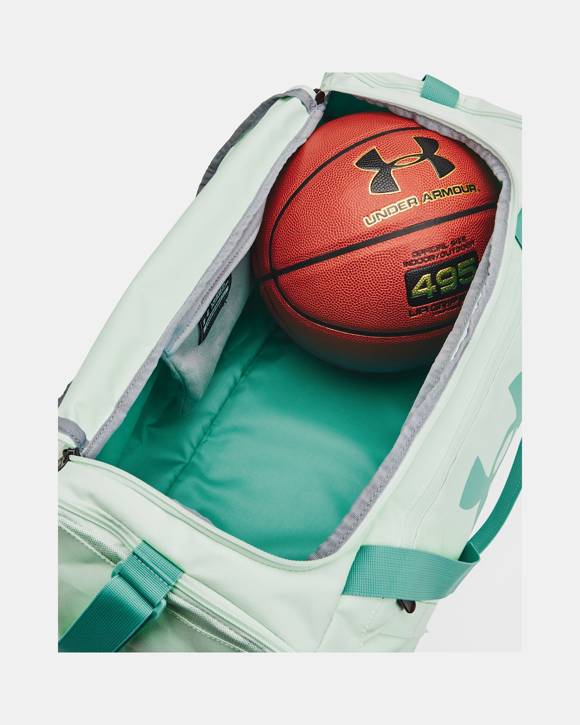 Green under store armour duffle bag