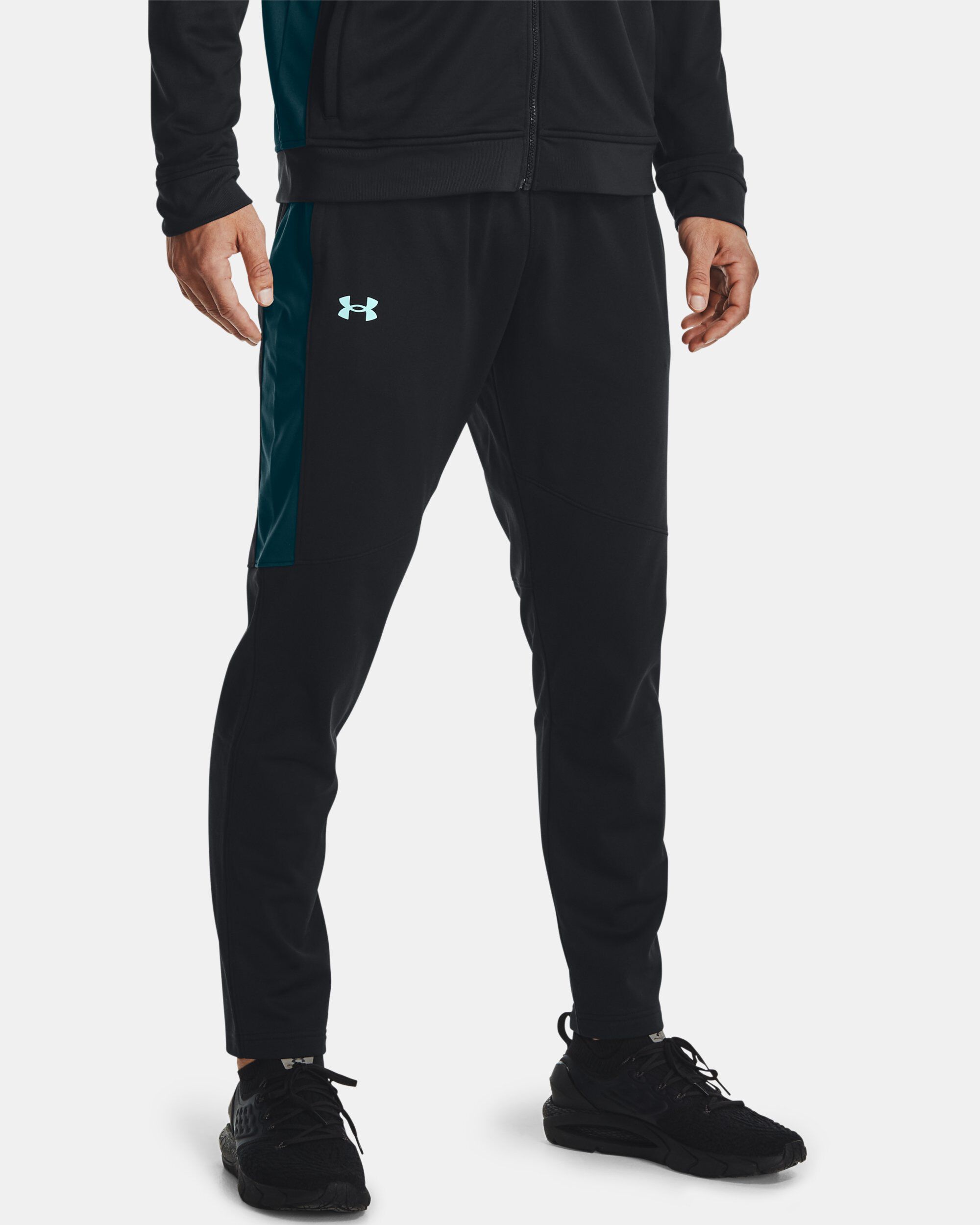 Under armour black track pants best sale